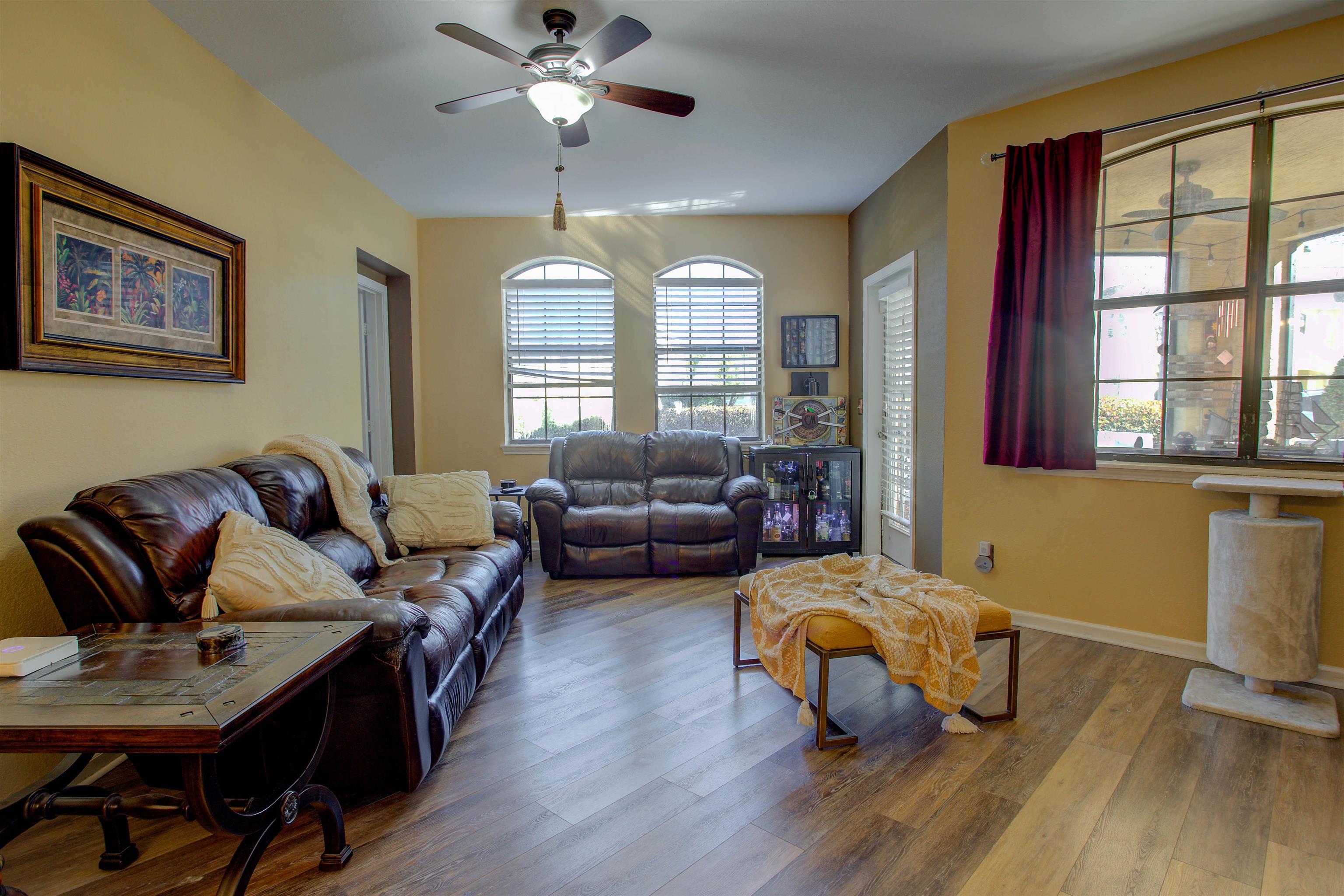 1800 Vista Cove Road St. Augustine, FL 32084 - Photo 26 of 58 a living room with furniture fireplace and a large window
