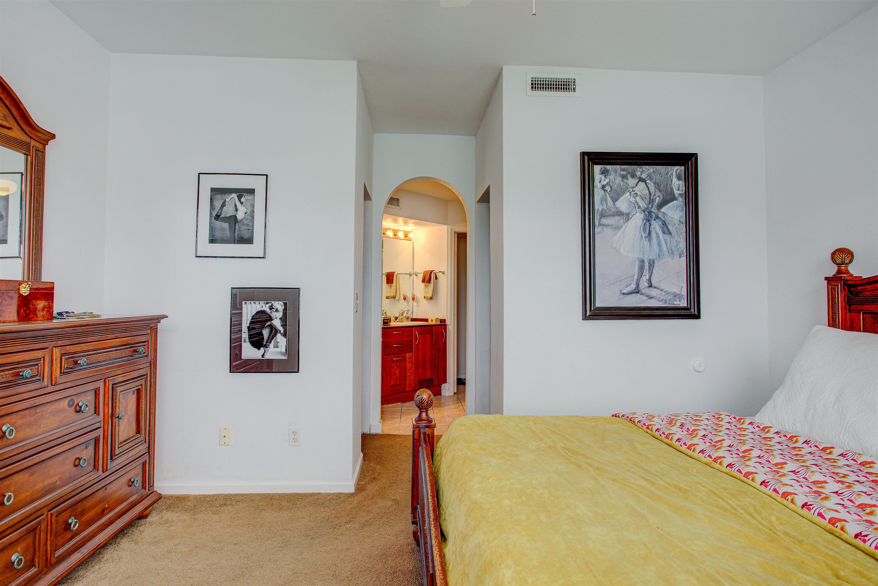 1800 Vista Cove Road St. Augustine, FL 32084 - Photo 28 of 69 a bedroom with a bed and a dresser