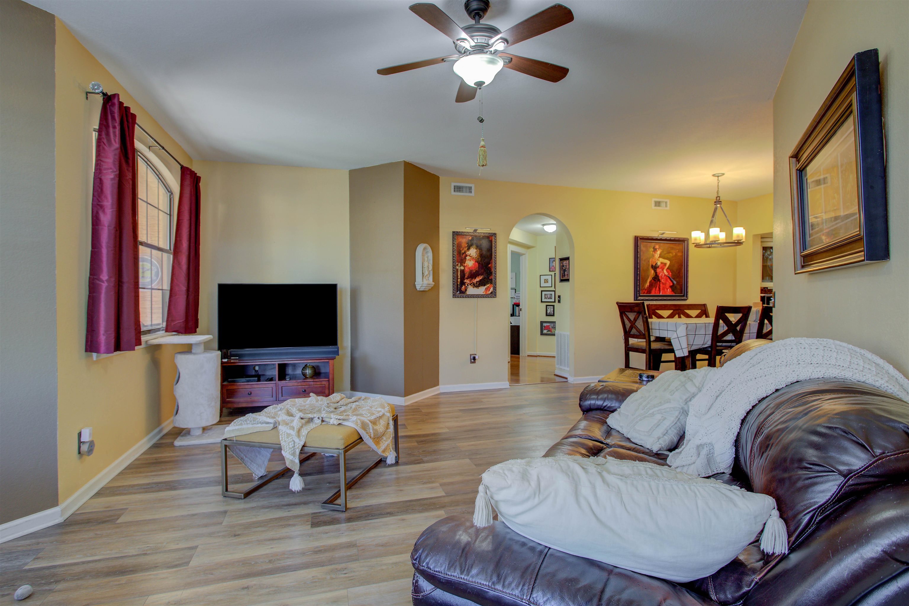 1800 Vista Cove Road St. Augustine, FL 32084 - Photo 29 of 58 a living room with furniture and a flat screen tv