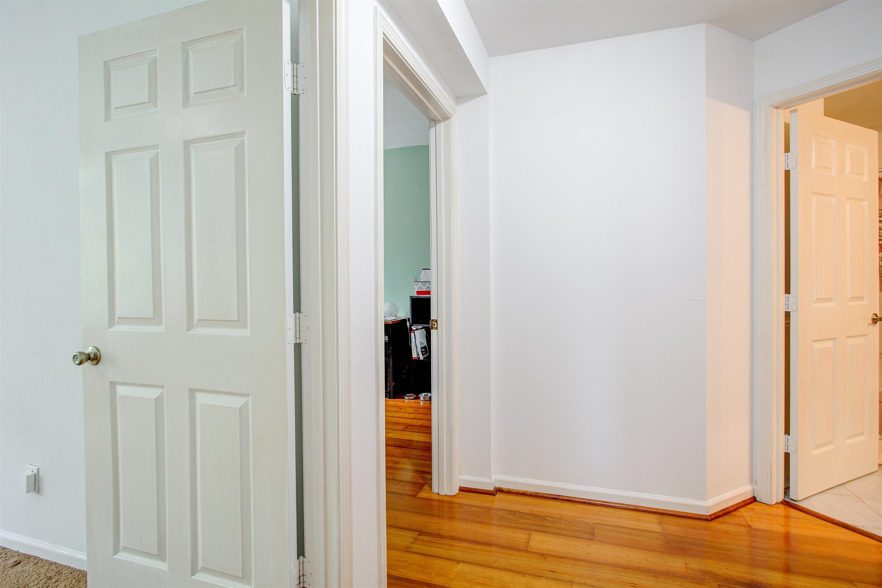 1800 Vista Cove Road St. Augustine, FL 32084 - Photo 29 of 69 Hallway with light wood finished floors and baseboards