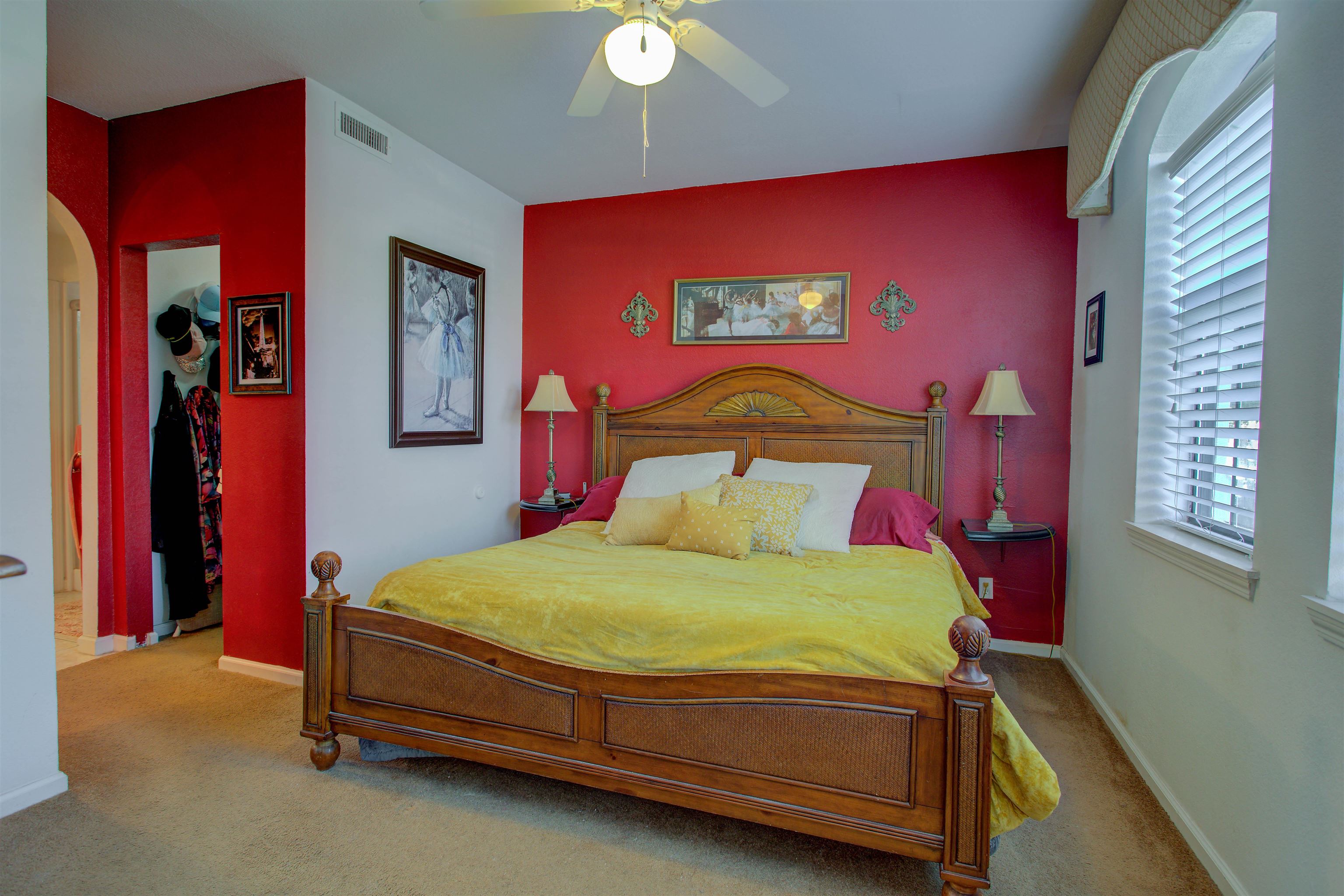 1800 Vista Cove Road St. Augustine, FL 32084 - Photo 31 of 58 Carpeted bedroom with arched walkways and ceiling fan