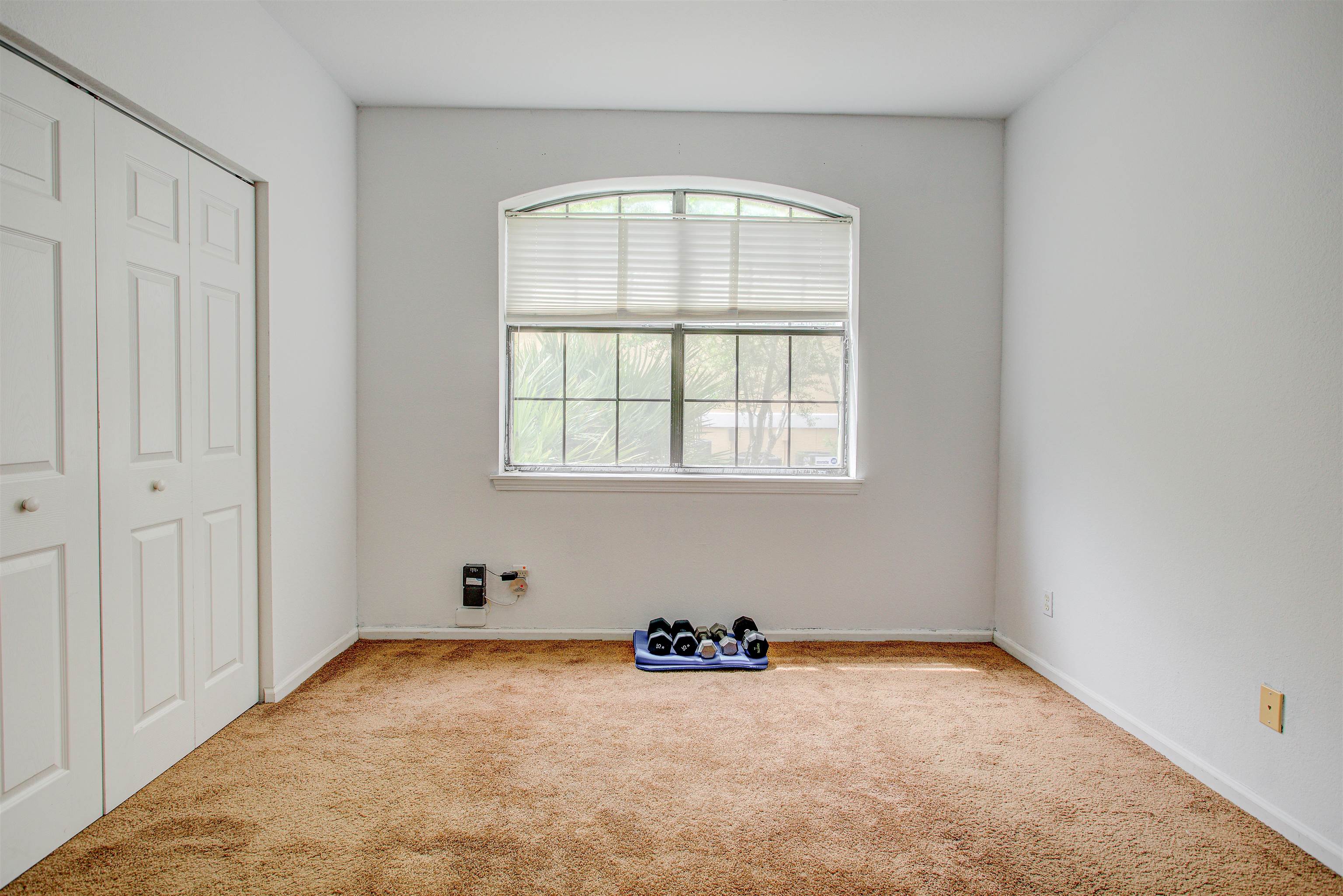 1800 Vista Cove Road St. Augustine, FL 32084 - Photo 32 of 69 Unfurnished bedroom featuring a closet and carpet