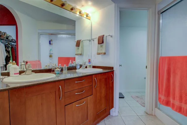 a bathroom with a shower and a toilet