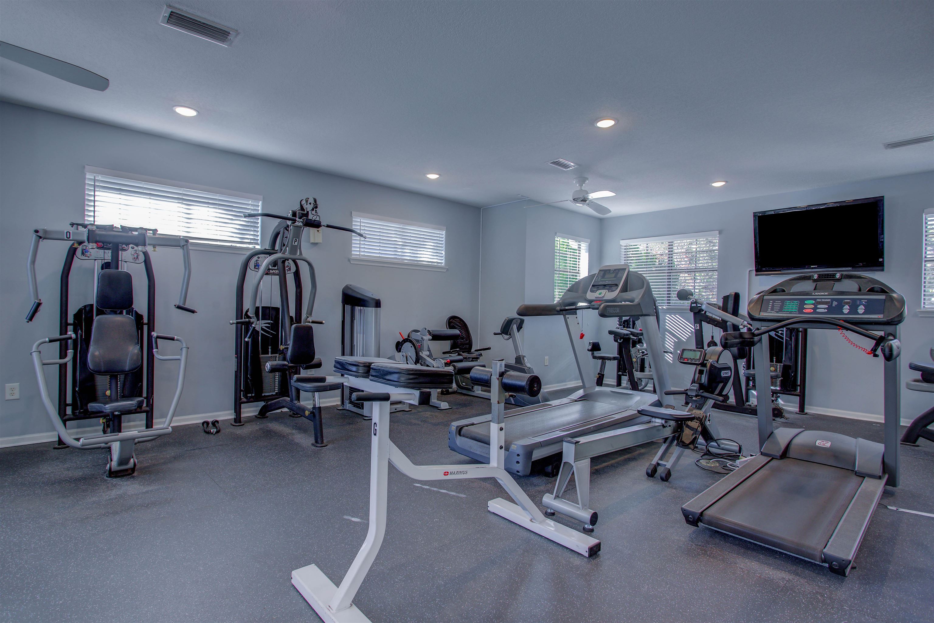 1800 Vista Cove Road St. Augustine, FL 32084 - Photo 67 of 69 Gym with ceiling fan and recessed lighting