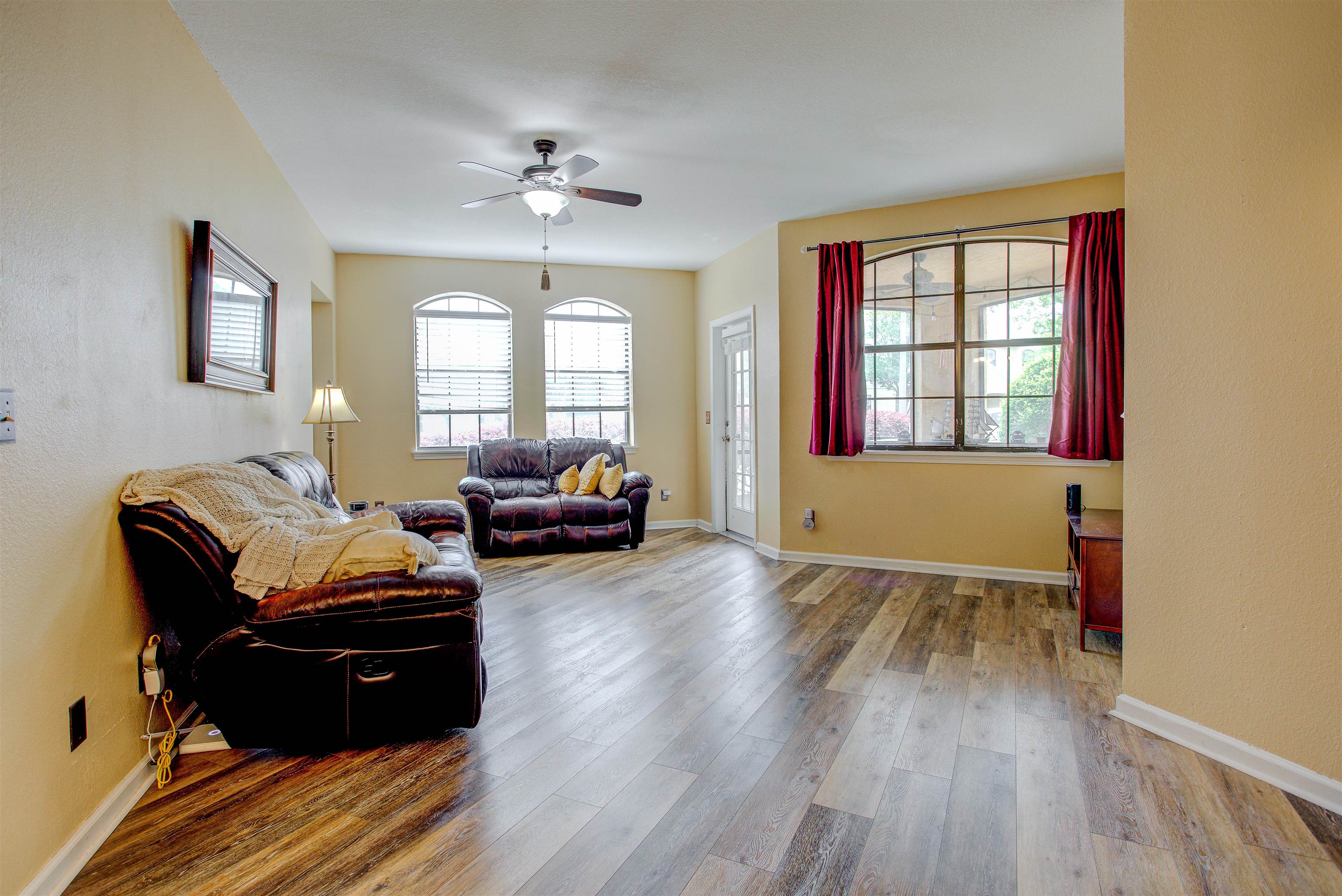 1800 Vista Cove Road St. Augustine, FL 32084 - Photo 7 of 69 Living room with light wood-style floors and a ceiling fan