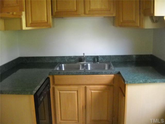 1307 Bahama Road Bahama, NC 27503 - Photo 7 of 12 Close up of cabinets in kitchen. Ready to move in.