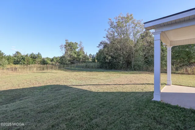 a view of outdoor space and yard