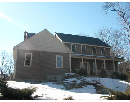 37 Concord Road Acton, MA 01720 - Photo 1 of 1 a front view of a house with a yard