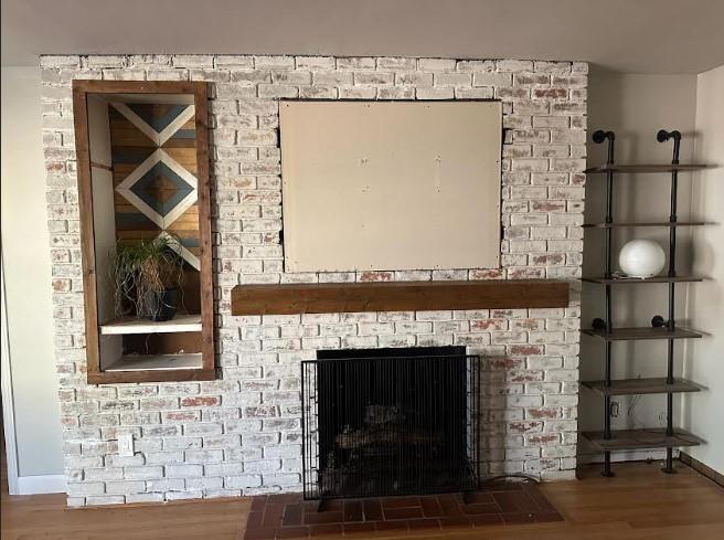 5291 Driskell Drive Winston, GA 30187 - Photo 11 of 29 a front view of a fireplace with wooden floor