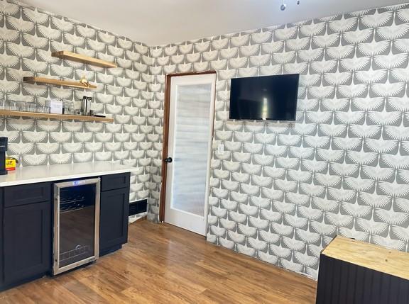 5291 Driskell Drive Winston, GA 30187 - Photo 8 of 29 a room with a stove and a flat screen tv