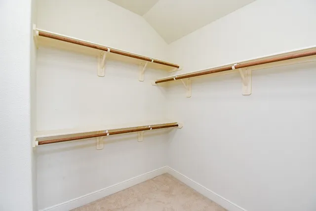 a view of a room with racks on the wall