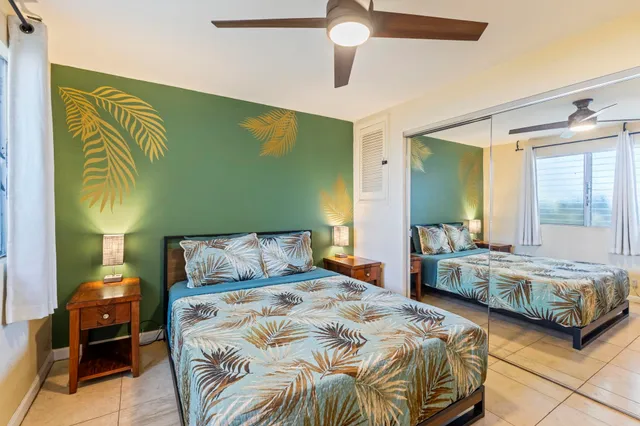 a bedroom with a bed and a walk in closet