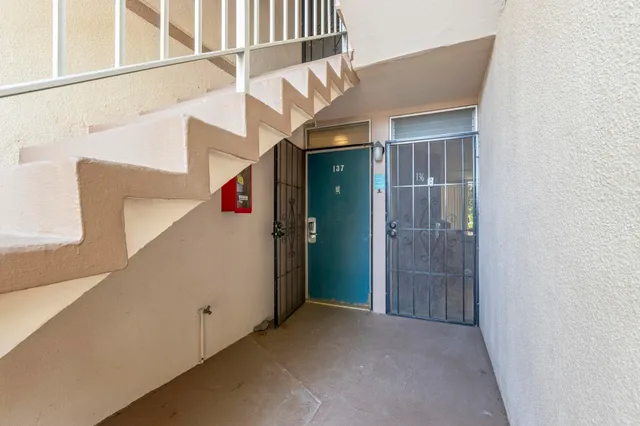 a view of a house with a door and a window