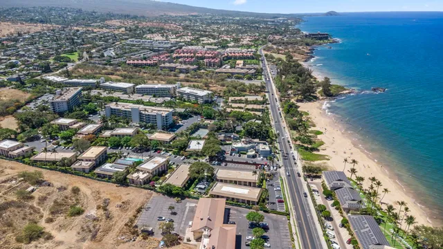 an aerial view of a house with a garden