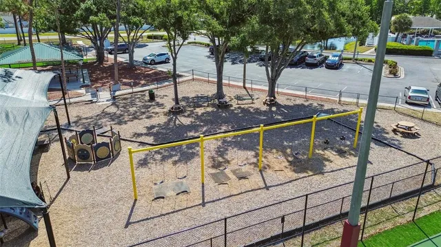an aerial view of a house with a swimming pool