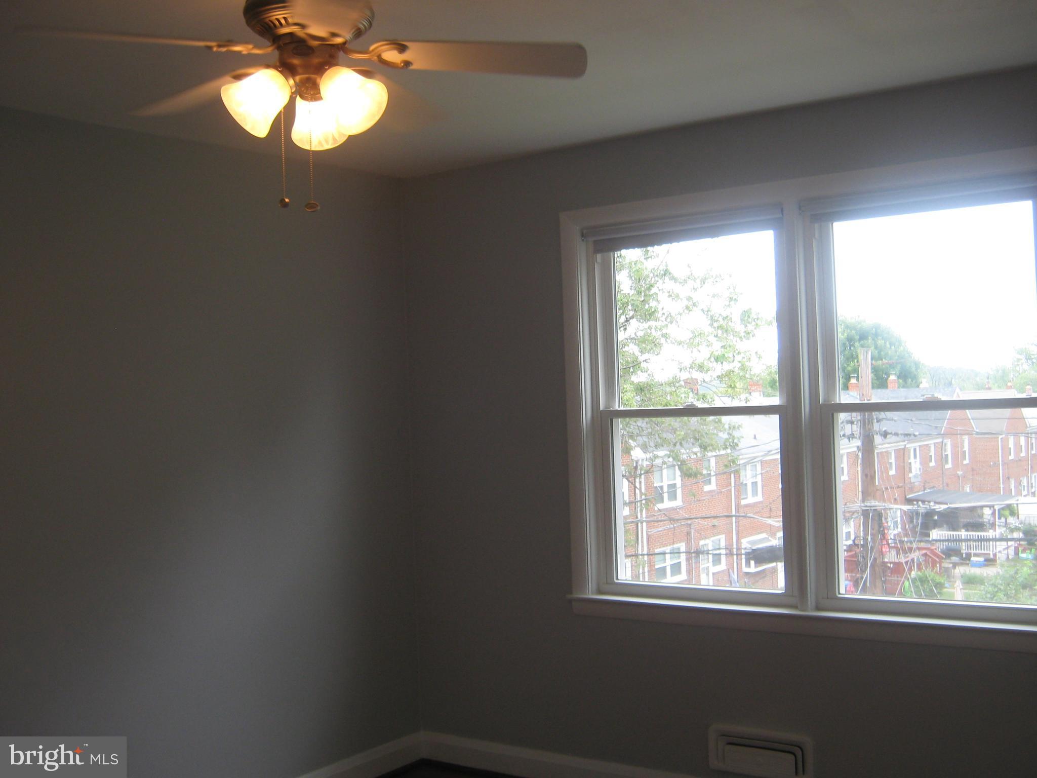 1113 Newfield Road Baltimore, MD 21207 - Photo 14 of 26 a view of a livingroom with a window