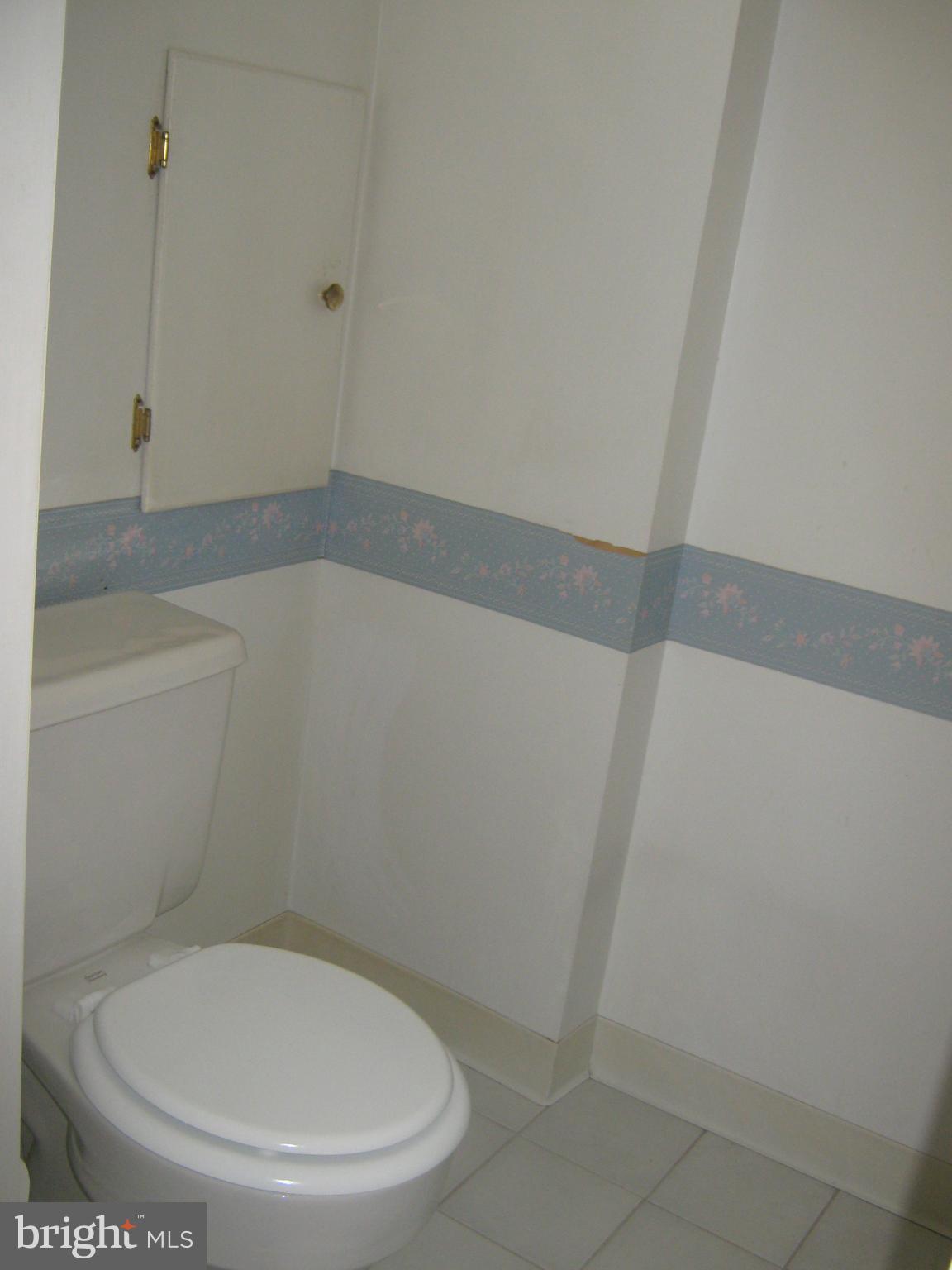 1113 Newfield Road Baltimore, MD 21207 - Photo 22 of 26 a bathroom with a toilet and a shower