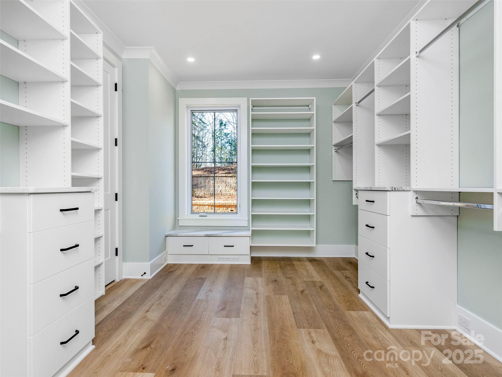 597 Evergreen Road Clover, SC 29710 - Photo 13 of 23 a view of walk in closet with empty racks