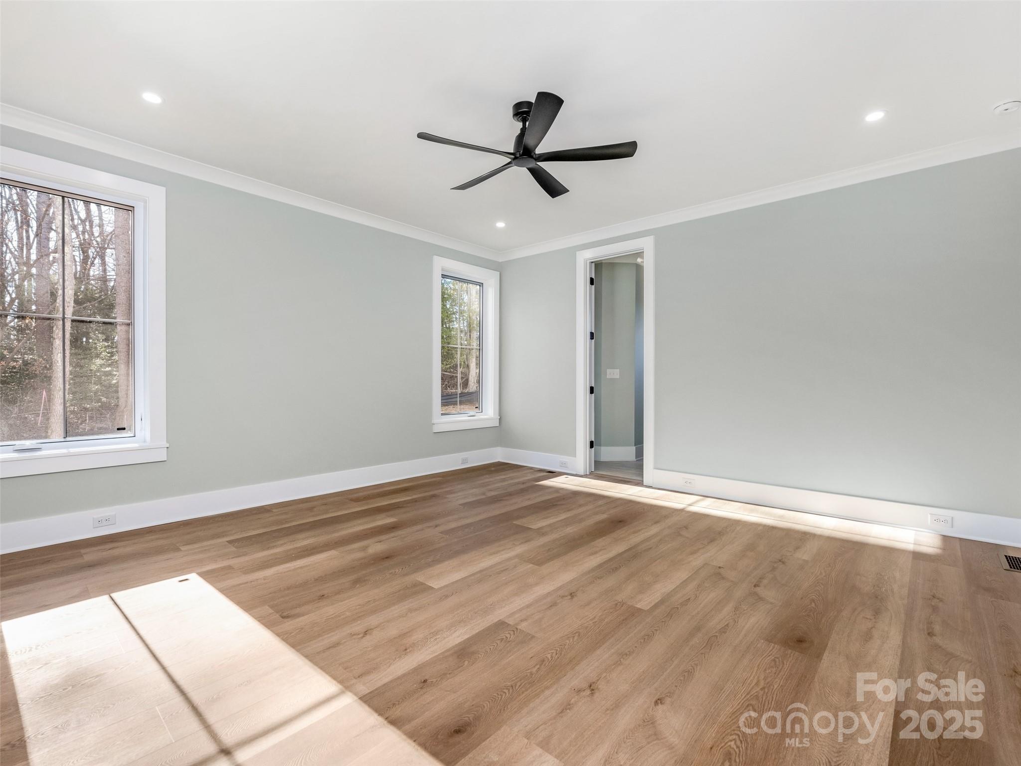 597 Evergreen Road Clover, SC 29710 - Photo 15 of 23 a view of empty room with wooden floor and fan