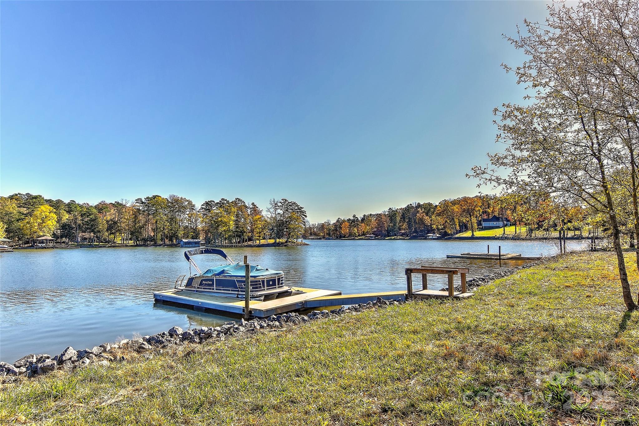 597 Evergreen Road Clover, SC 29710 - Photo 21 of 23 a view of a lake with a nearby beach