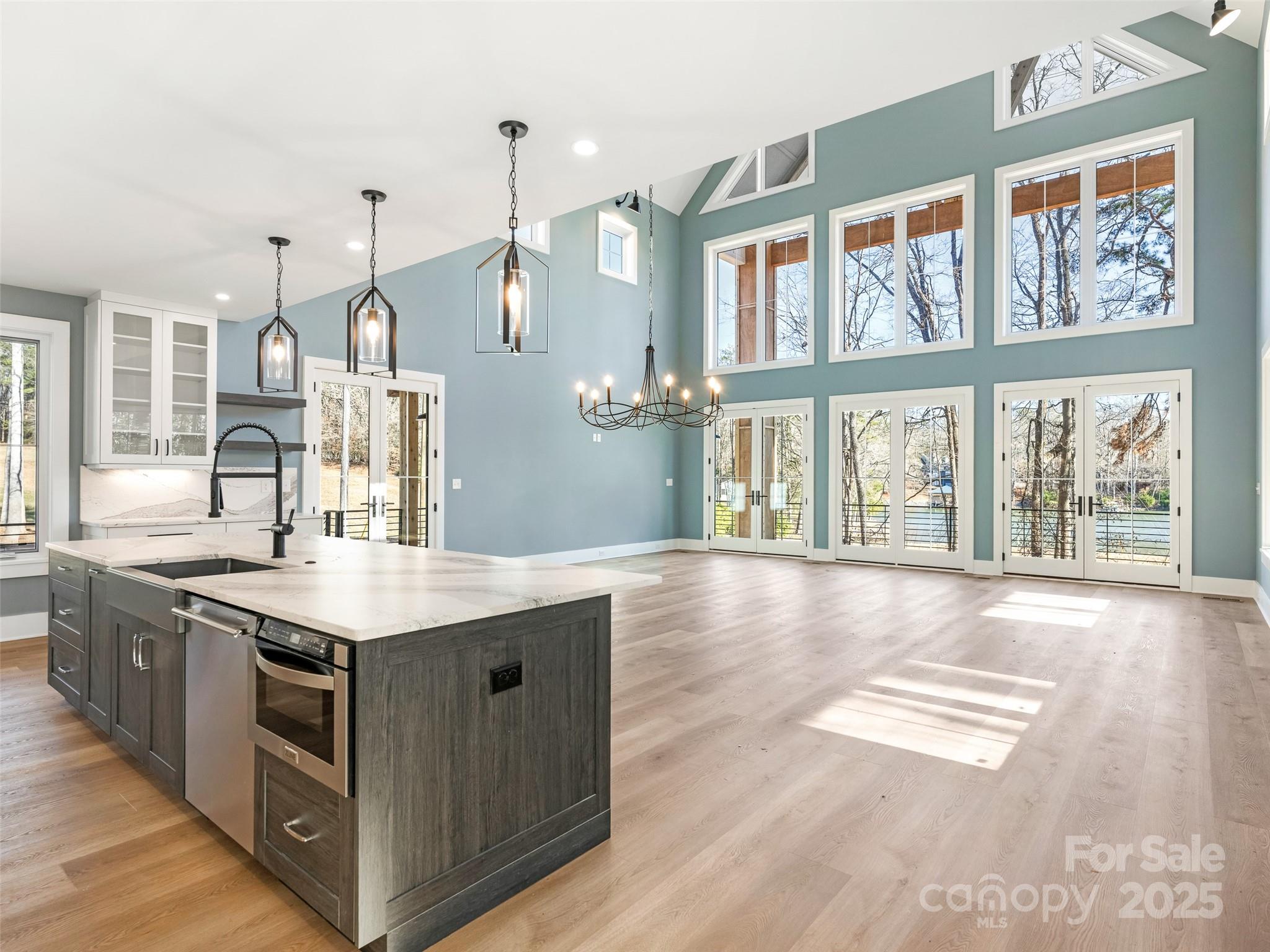 597 Evergreen Road Clover, SC 29710 - Photo 4 of 23 a kitchen with stainless steel appliances granite countertop a stove a sink and a wooden floors