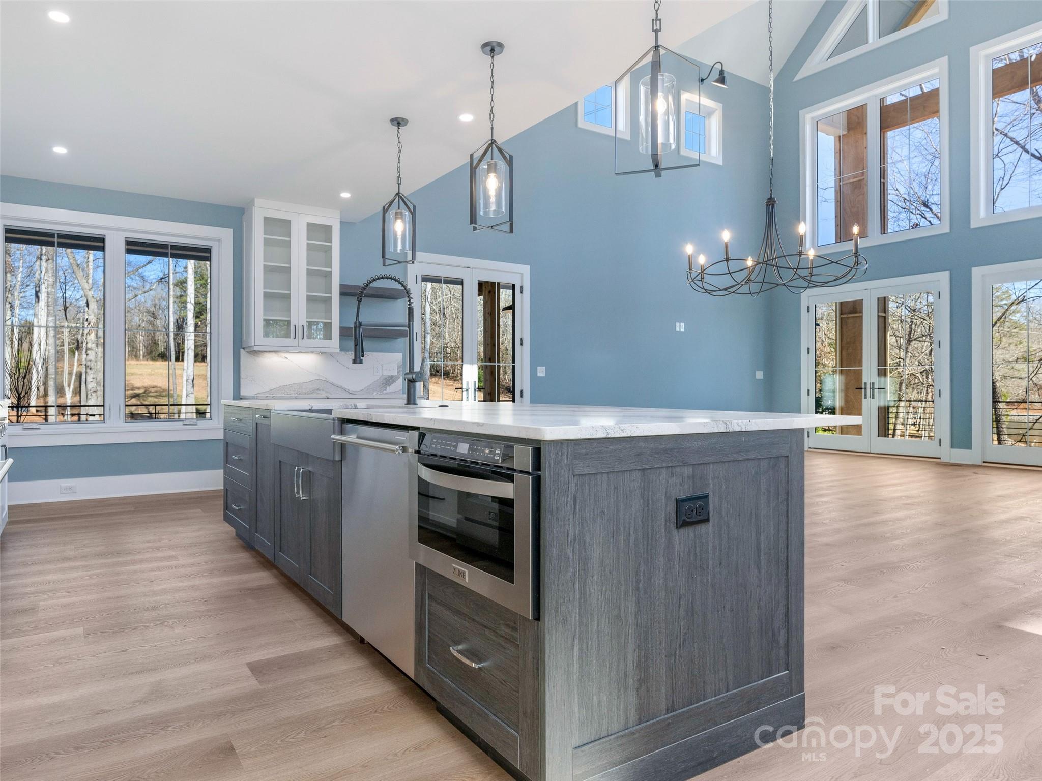 597 Evergreen Road Clover, SC 29710 - Photo 5 of 23 a kitchen with a stove and a wooden floors