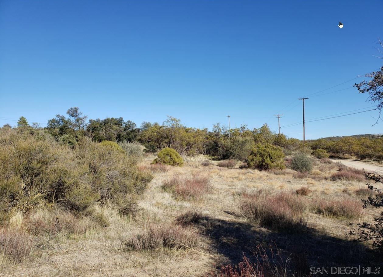 0 Th Anza, CA 92539 - Photo 3 of 10 a view of a dry yard with trees in the background