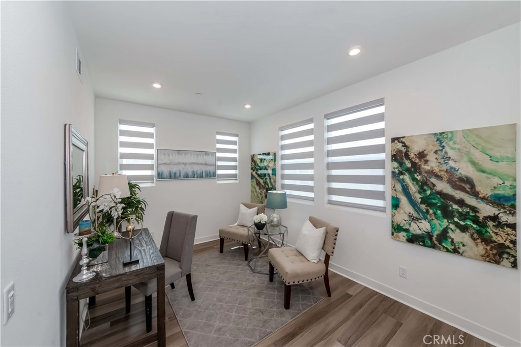1403 West Bushell Street Anaheim, CA 92805 - Photo 15 of 31 a living room with furniture and a potted plant
