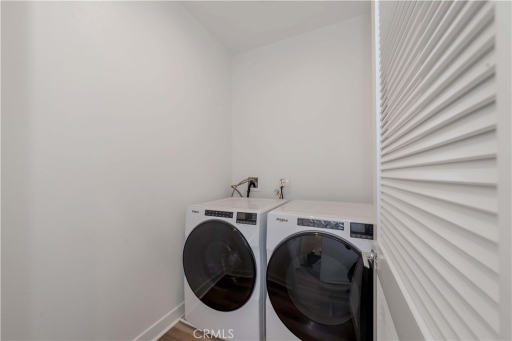 1403 West Bushell Street Anaheim, CA 92805 - Photo 22 of 31 a utility room with dryer and washer