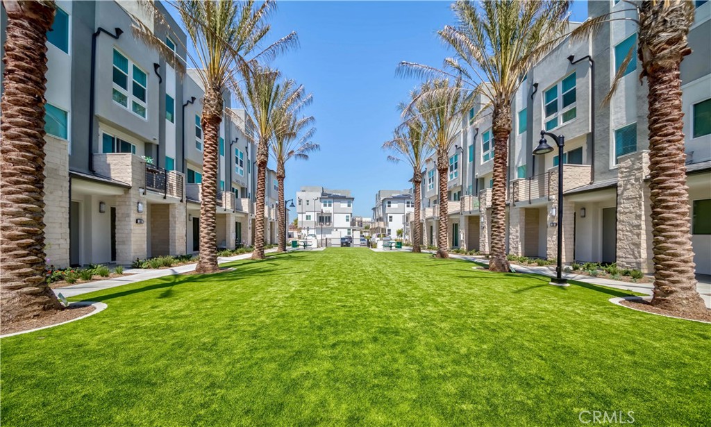 1403 West Bushell Street Anaheim, CA 92805 - Photo 29 of 31 a view of a yard with tall buildings