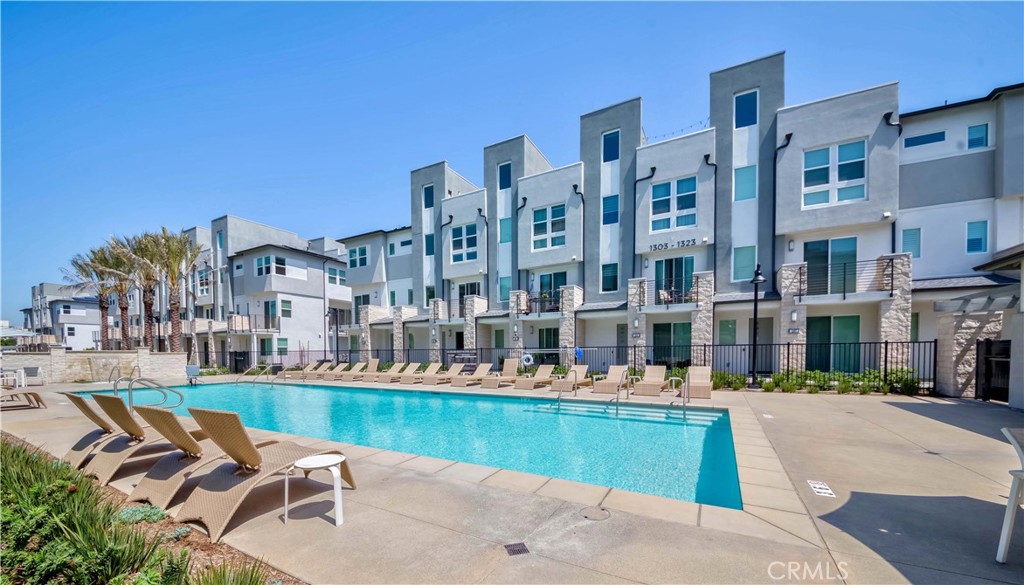 1403 West Bushell Street Anaheim, CA 92805 - Photo 31 of 31 a view of swimming pool in front of building