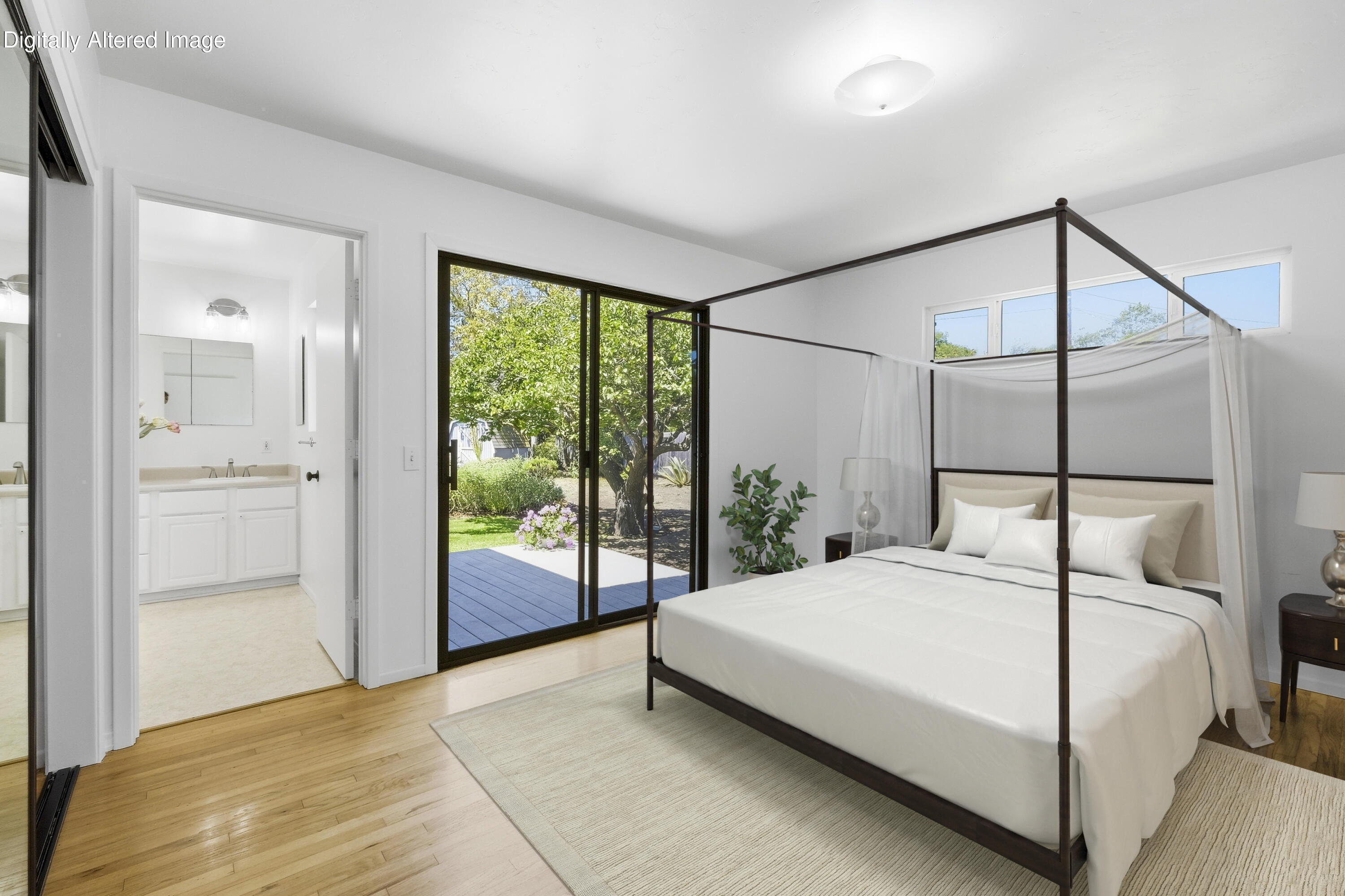 529 Via Rueda Santa Barbara, CA 93110 - Photo 17 of 34 a bedroom with a large bed and a large window