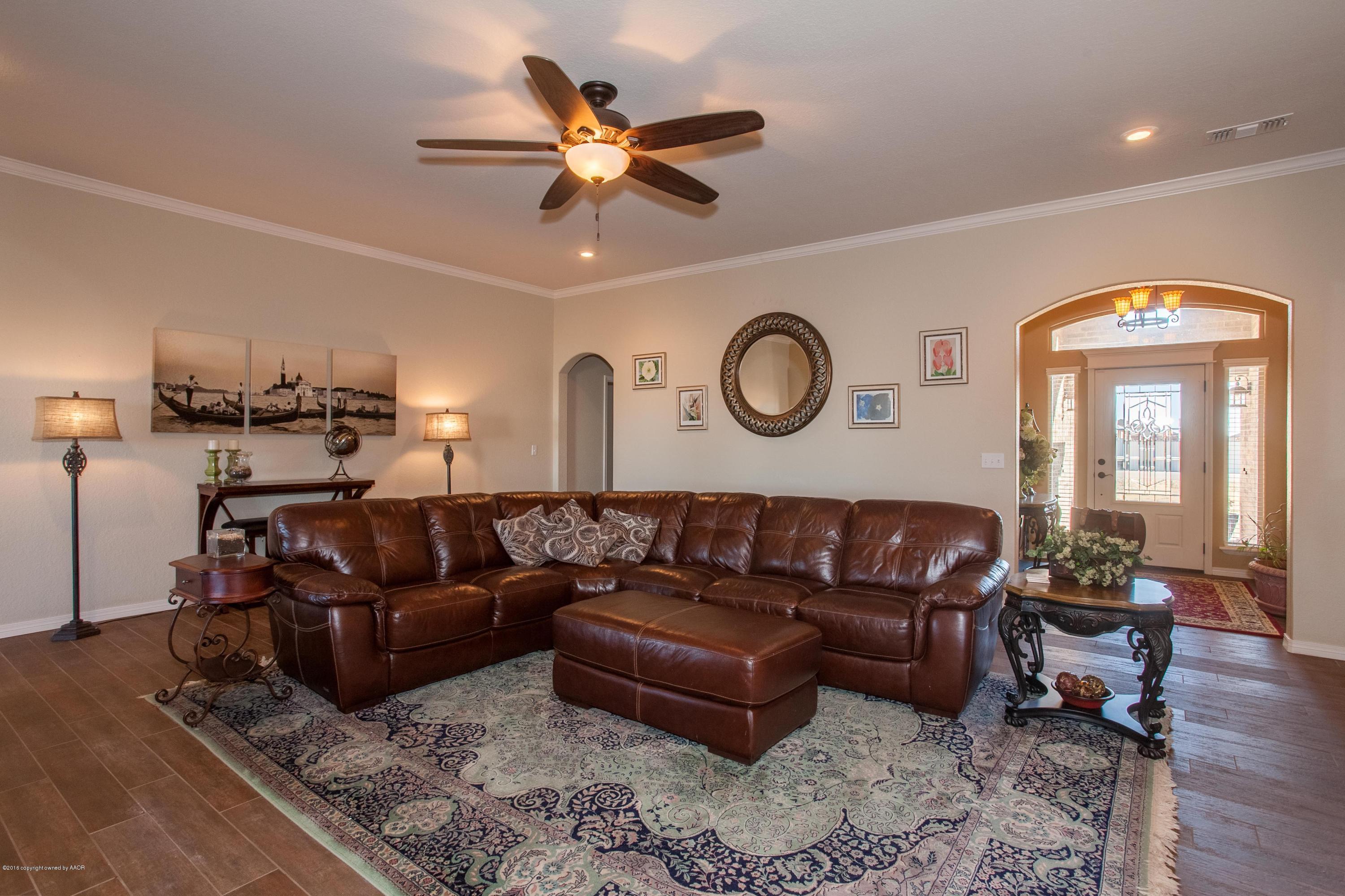 18000 Morning Star Road Bushland, TX 79124 - Photo 3 of 53 a living room with furniture and a large window
