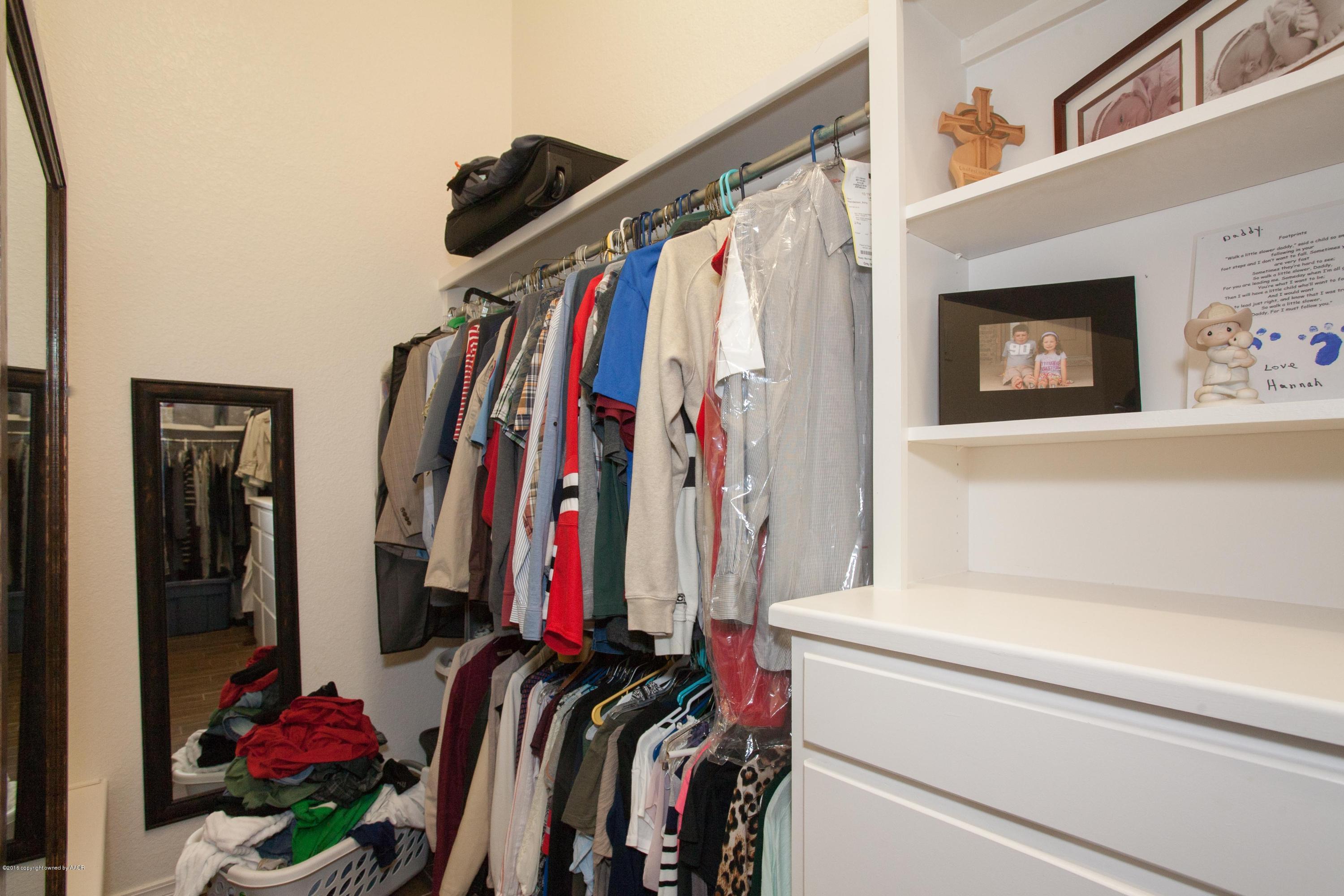 18000 Morning Star Road Bushland, TX 79124 - Photo 38 of 53 a view of walk in closet with clothes and shoes