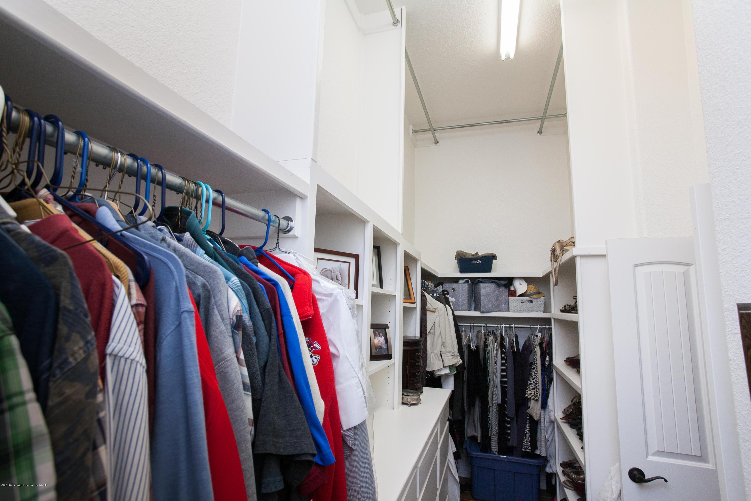 18000 Morning Star Road Bushland, TX 79124 - Photo 40 of 53 a view of walk in closet with clothes and shoes