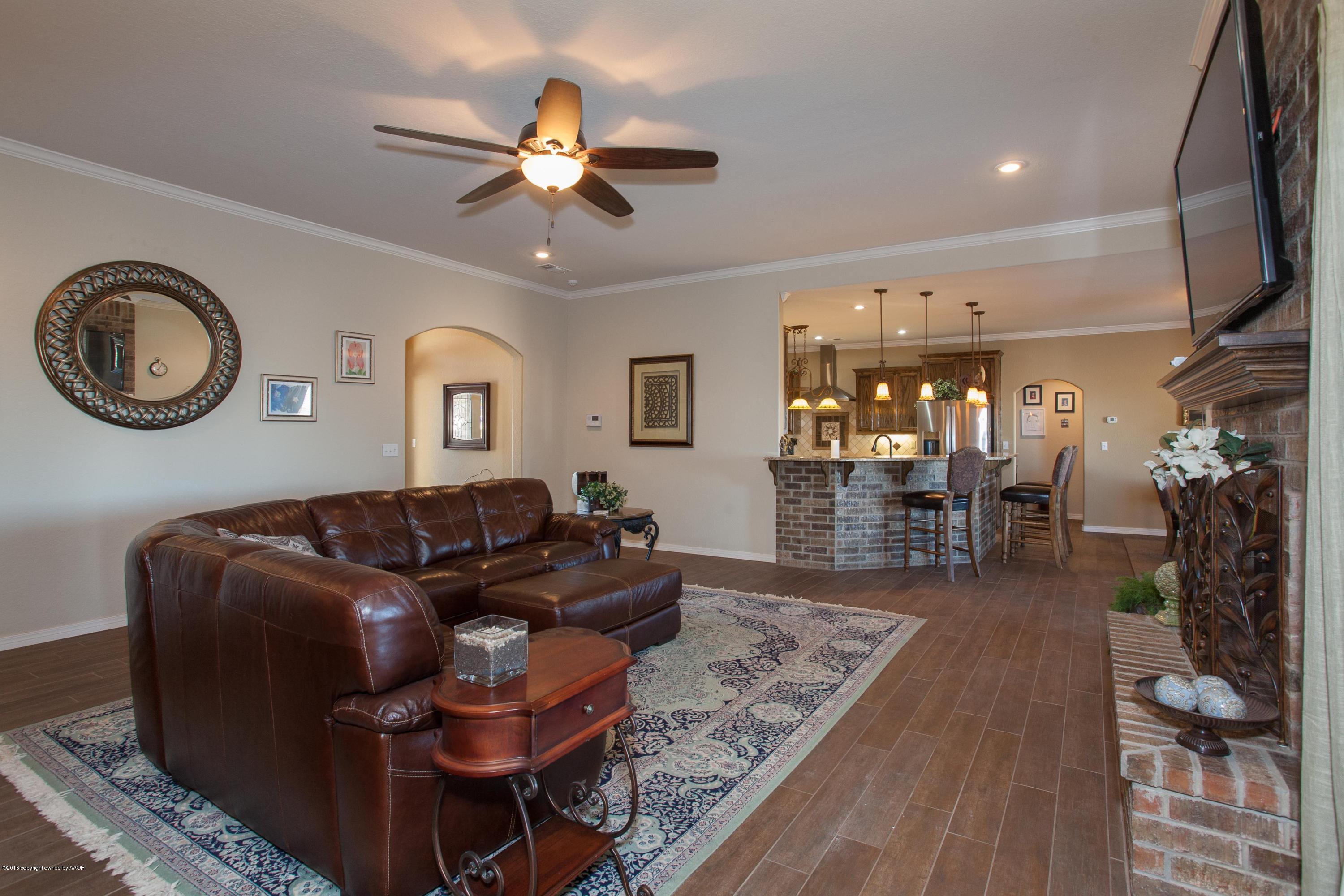 18000 Morning Star Road Bushland, TX 79124 - Photo 4 of 53 a living room with furniture and wooden floor
