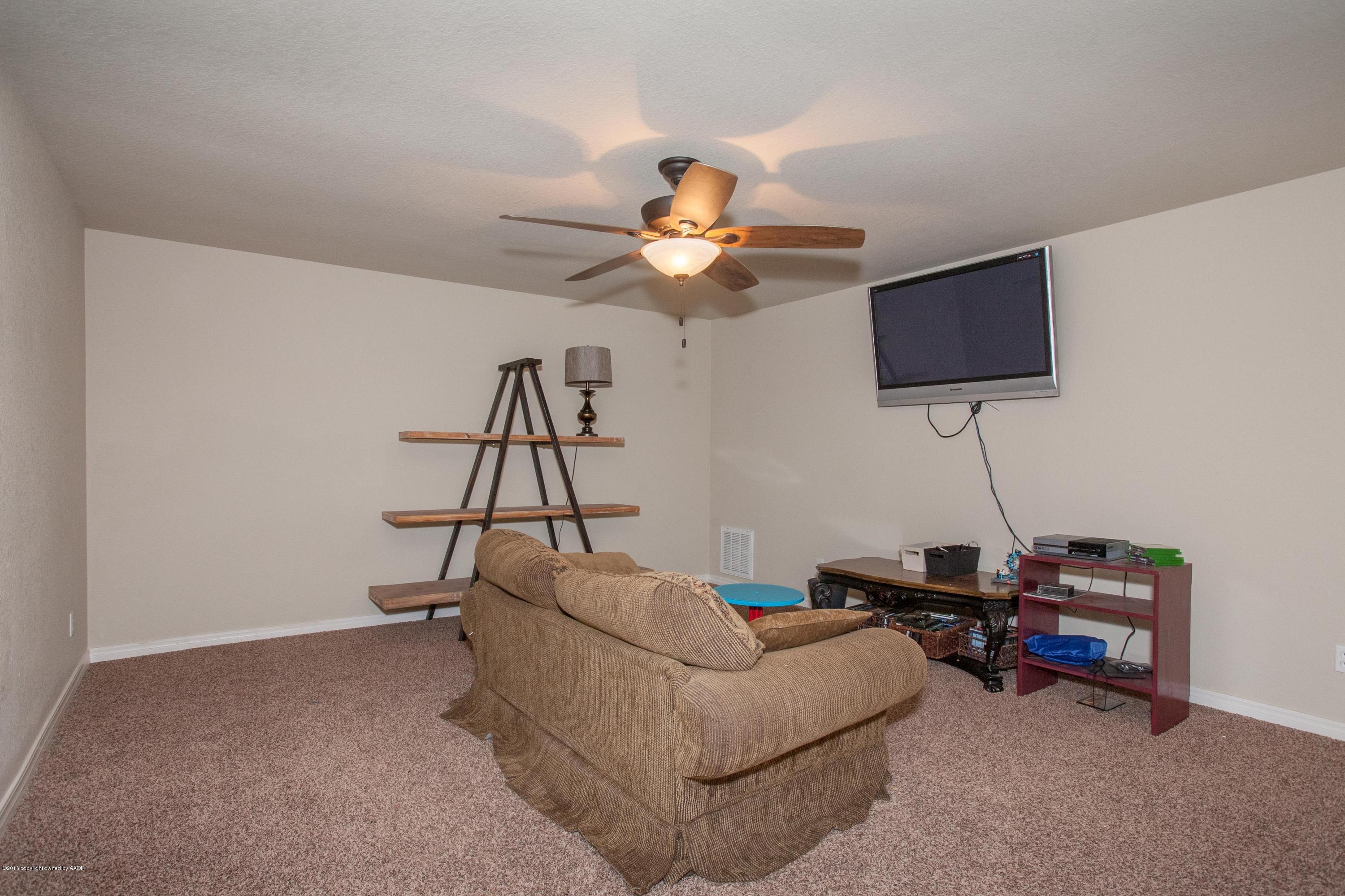 18000 Morning Star Road Bushland, TX 79124 - Photo 41 of 53 a living room with furniture and a ceiling fan