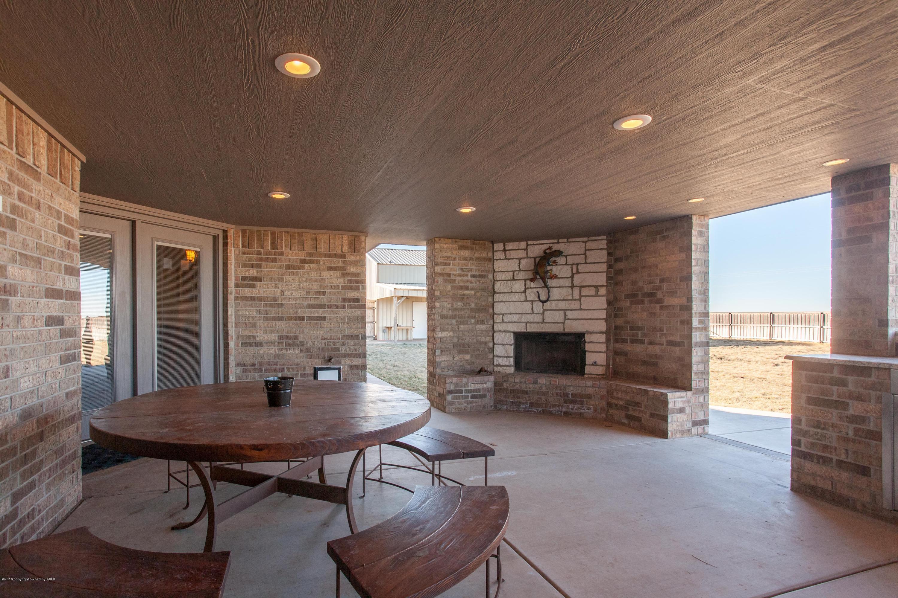 18000 Morning Star Road Bushland, TX 79124 - Photo 43 of 53 a view of a livingroom with furniture and a fireplace