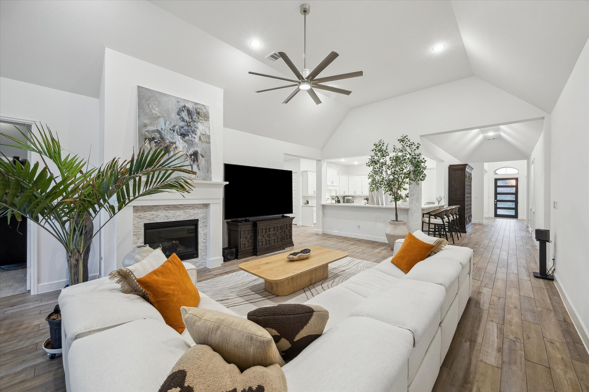 9823 Chapman Trail Manvel, TX 77578 - Photo 18 of 47 This inviting space is truly made for both entertaining and everyday relaxation. Imagine gathering with friends and family in this beautiful but comfortable space. The modern aesthetic is enhanced by recessed lighting and a sleek ceiling fan.