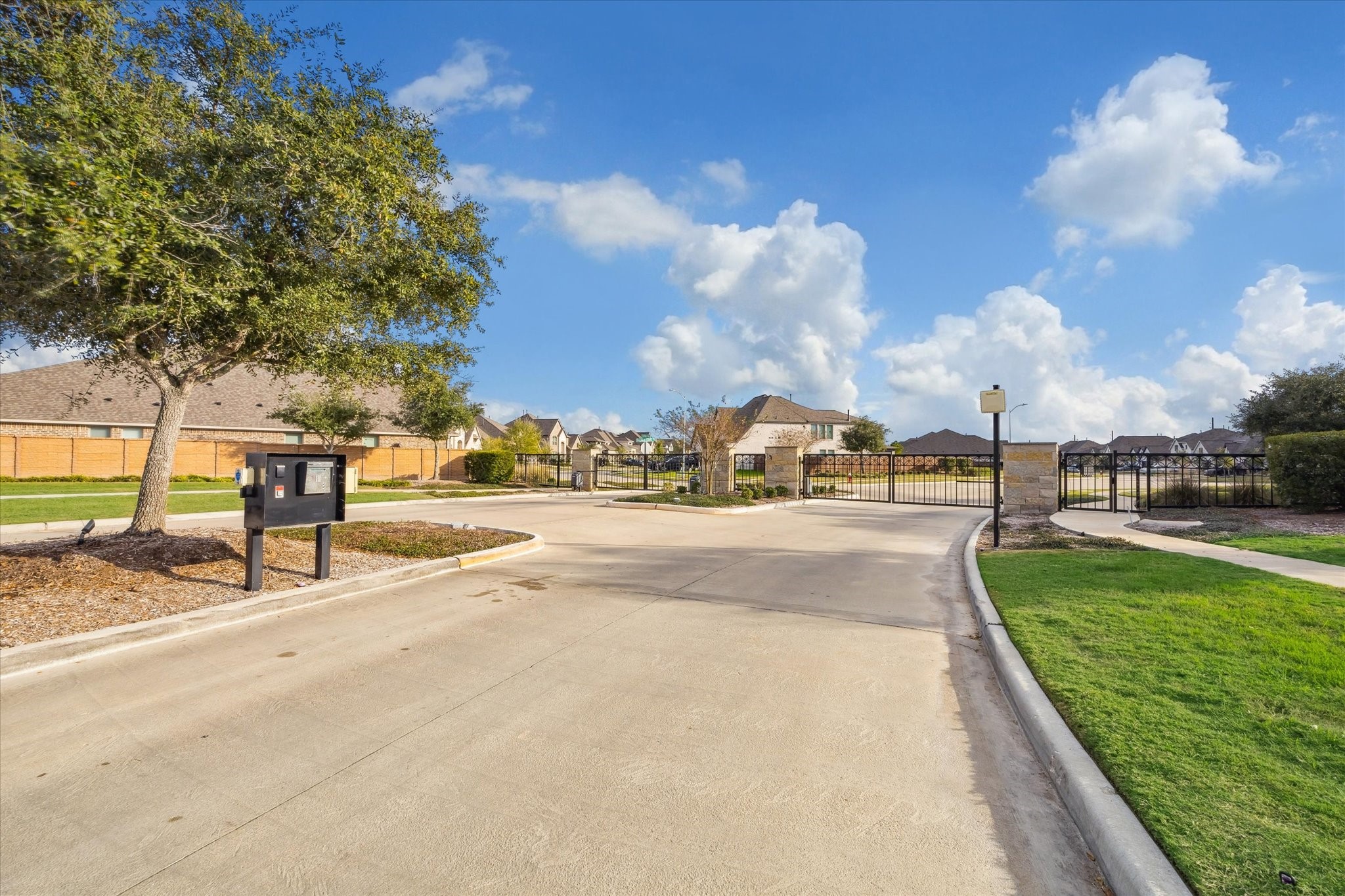 9823 Chapman Trail Manvel, TX 77578 - Photo 2 of 47 What a nice welcome everyday as you come and go! Peaceful and secure, this section of the neighborhood features a beautifully landscaped, gated entrance.