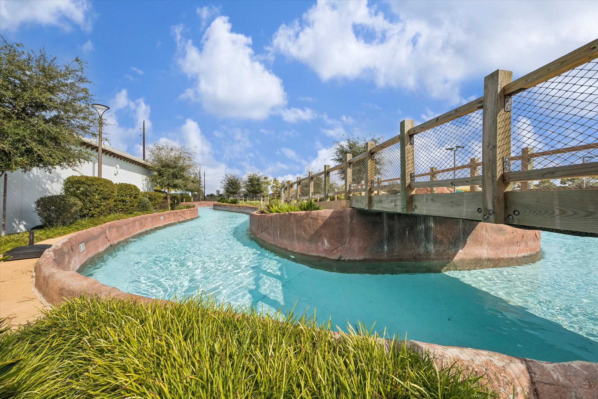 9823 Chapman Trail Manvel, TX 77578 - Photo 36 of 47 Here you'll find an island pool, a wave pool, and even a tidal river!