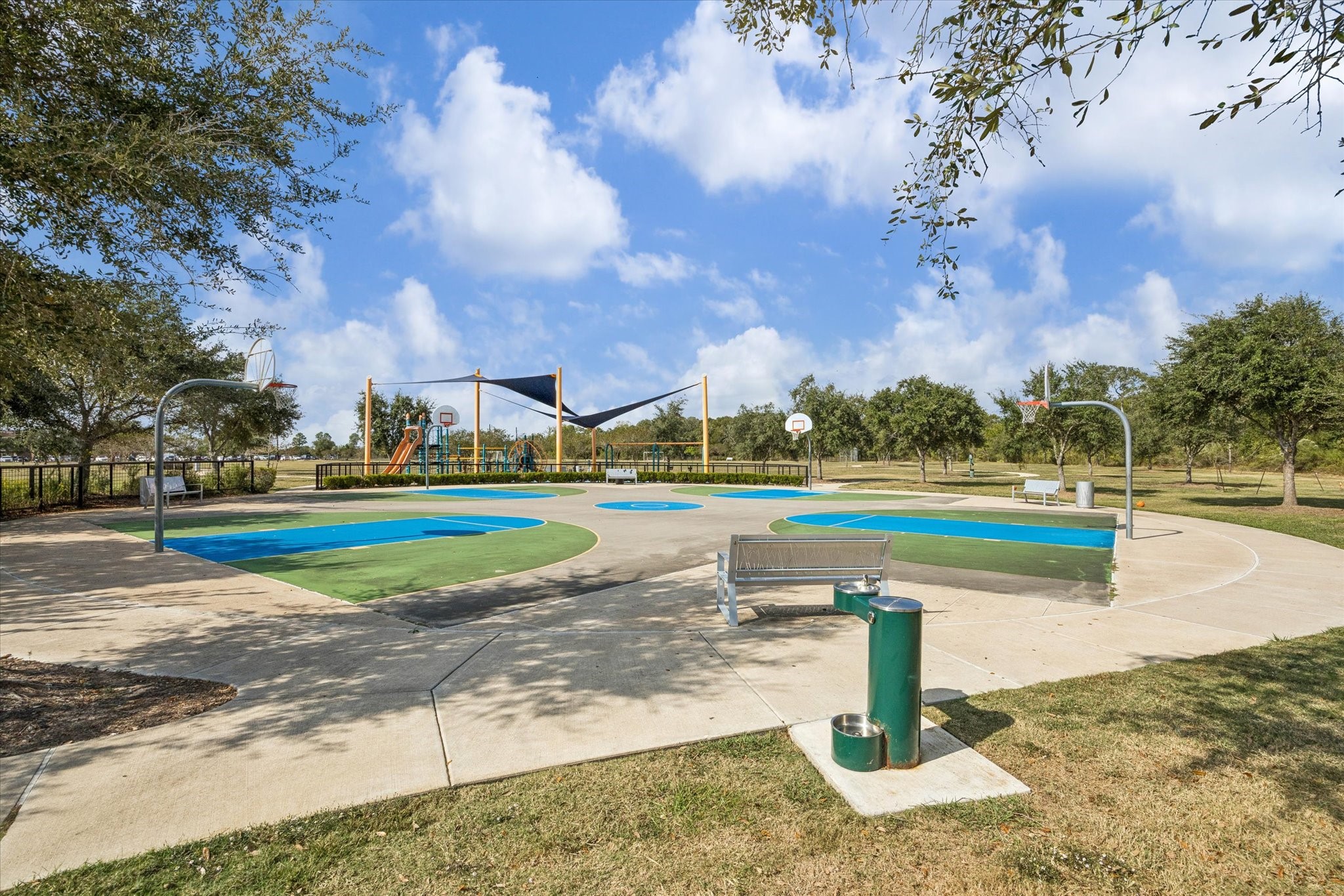 9823 Chapman Trail Manvel, TX 77578 - Photo 42 of 47 This is just a glimpse of Iowa Colony Regional Park where you'll find space for soccer, baseball, a quadplex basketball court, two grass volleyball courts and a tree-lined walking trail that winds around the perimeter of the central green space.