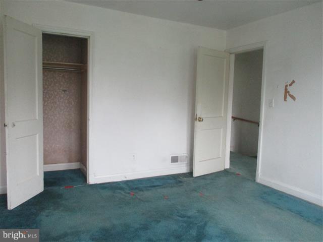 2707 Edison Highway Baltimore, MD 21213 - Photo 17 of 25 an empty room with closet