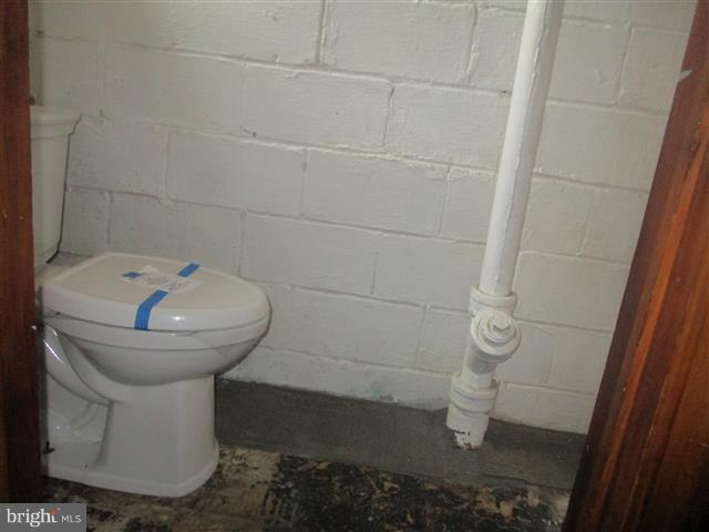 2707 Edison Highway Baltimore, MD 21213 - Photo 21 of 25 a bathroom with a sink and toilet