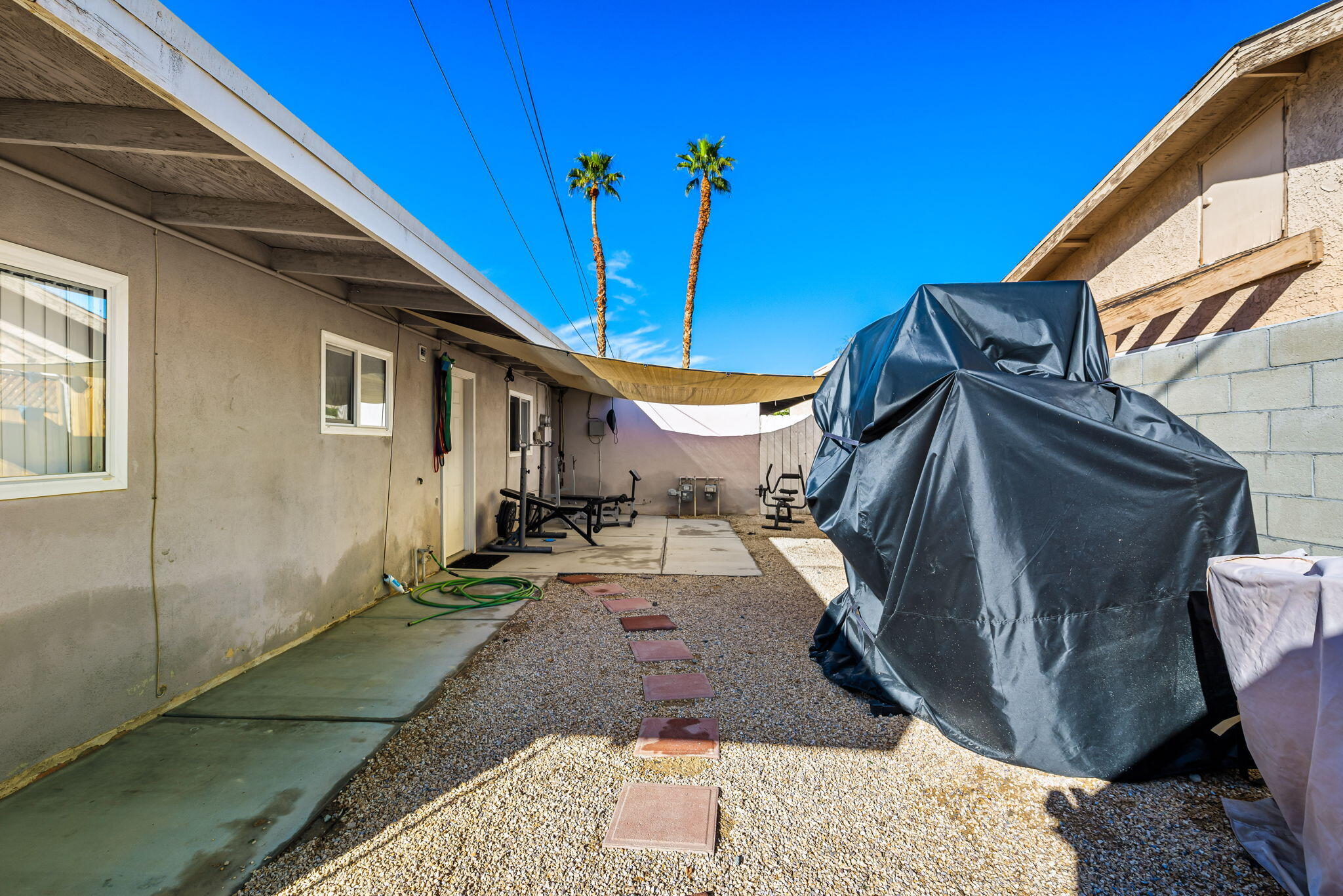 73333 Santa Rosa Way Palm Desert, CA 92260 - Photo 12 of 37 a view of a house with a patio