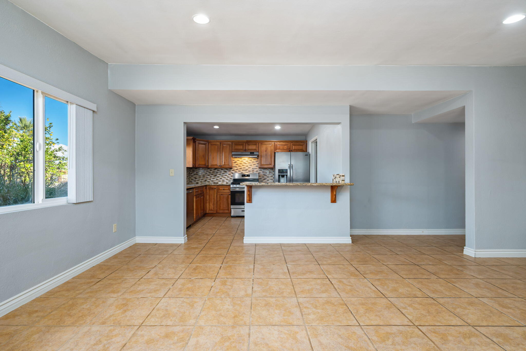 73333 Santa Rosa Way Palm Desert, CA 92260 - Photo 19 of 37 a view of kitchen with furniture and window