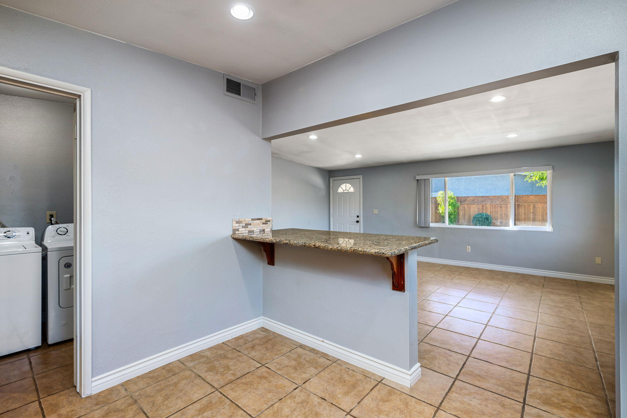 73333 Santa Rosa Way Palm Desert, CA 92260 - Photo 24 of 37 a view of a kitchen with a sink and a window