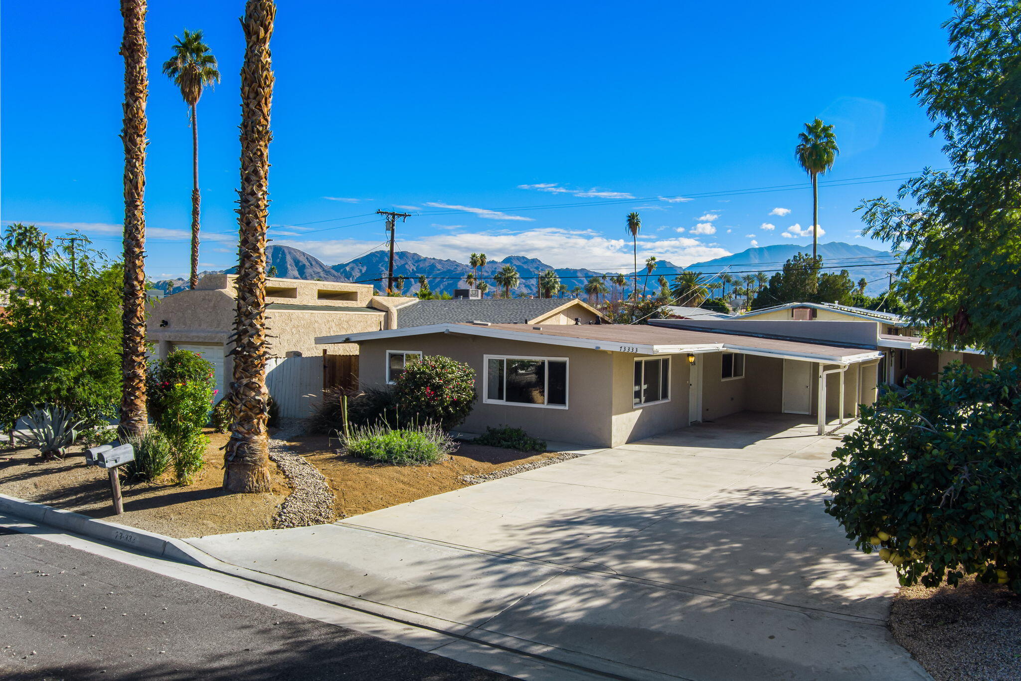 73333 Santa Rosa Way Palm Desert, CA 92260 - Photo 33 of 37 a view of a house with a patio