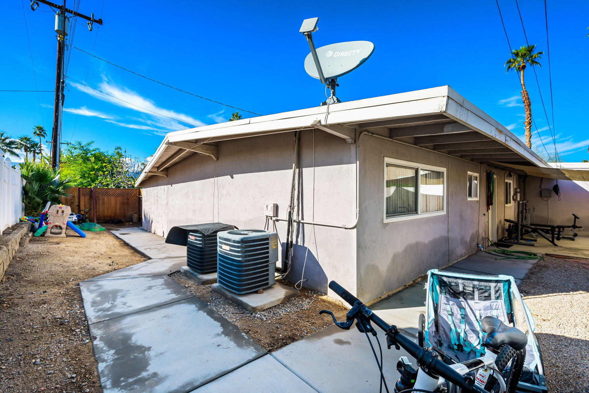73333 Santa Rosa Way Palm Desert, CA 92260 - Photo 10 of 37 a front view of a house with patio