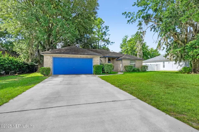 a front view of house with yard